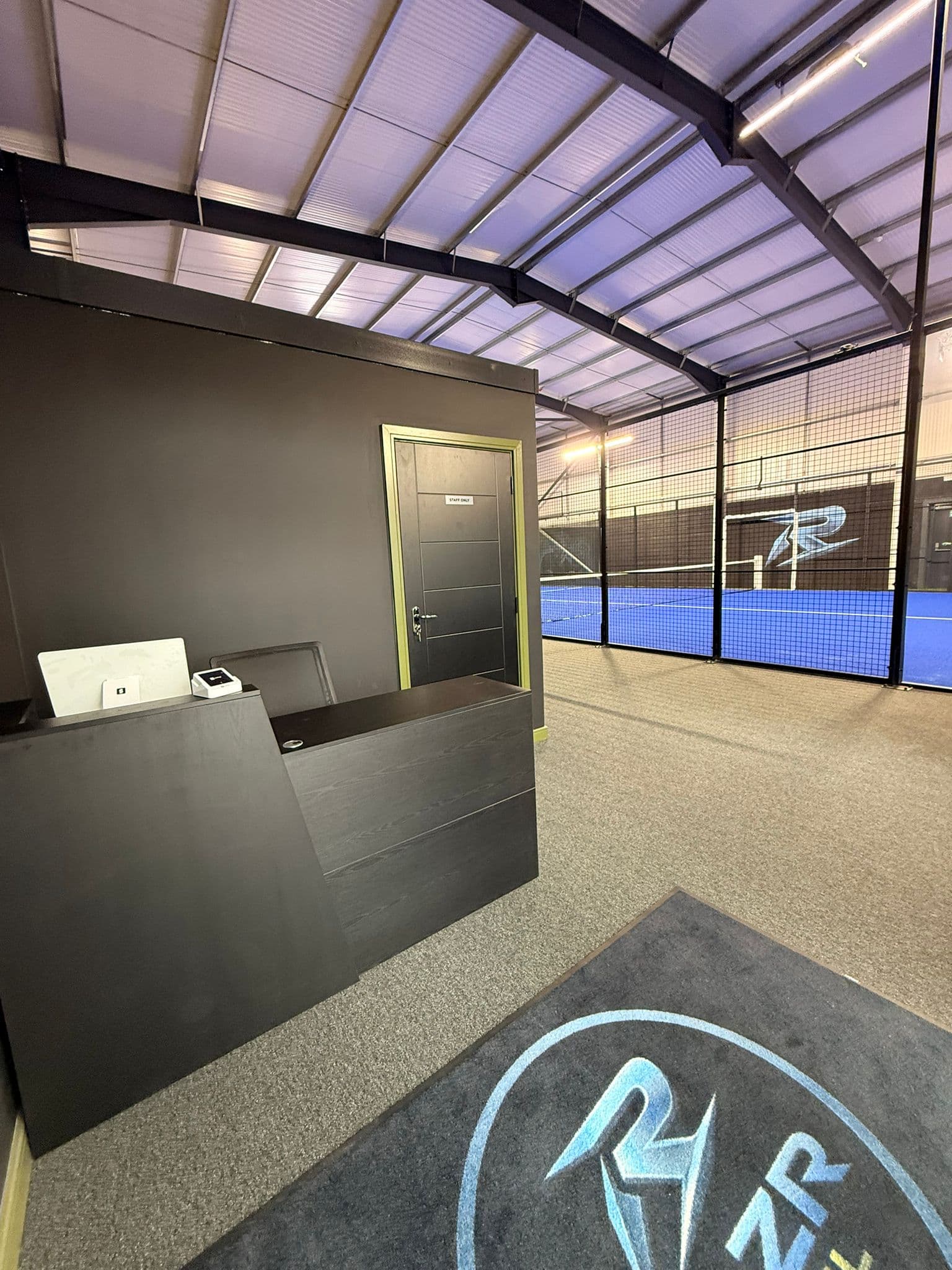 Reception area at RAZR Padel
